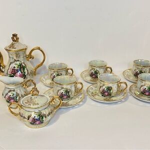 Japan Rags Cream and Gold Porcelain Tea Set with Decorative Scenes
